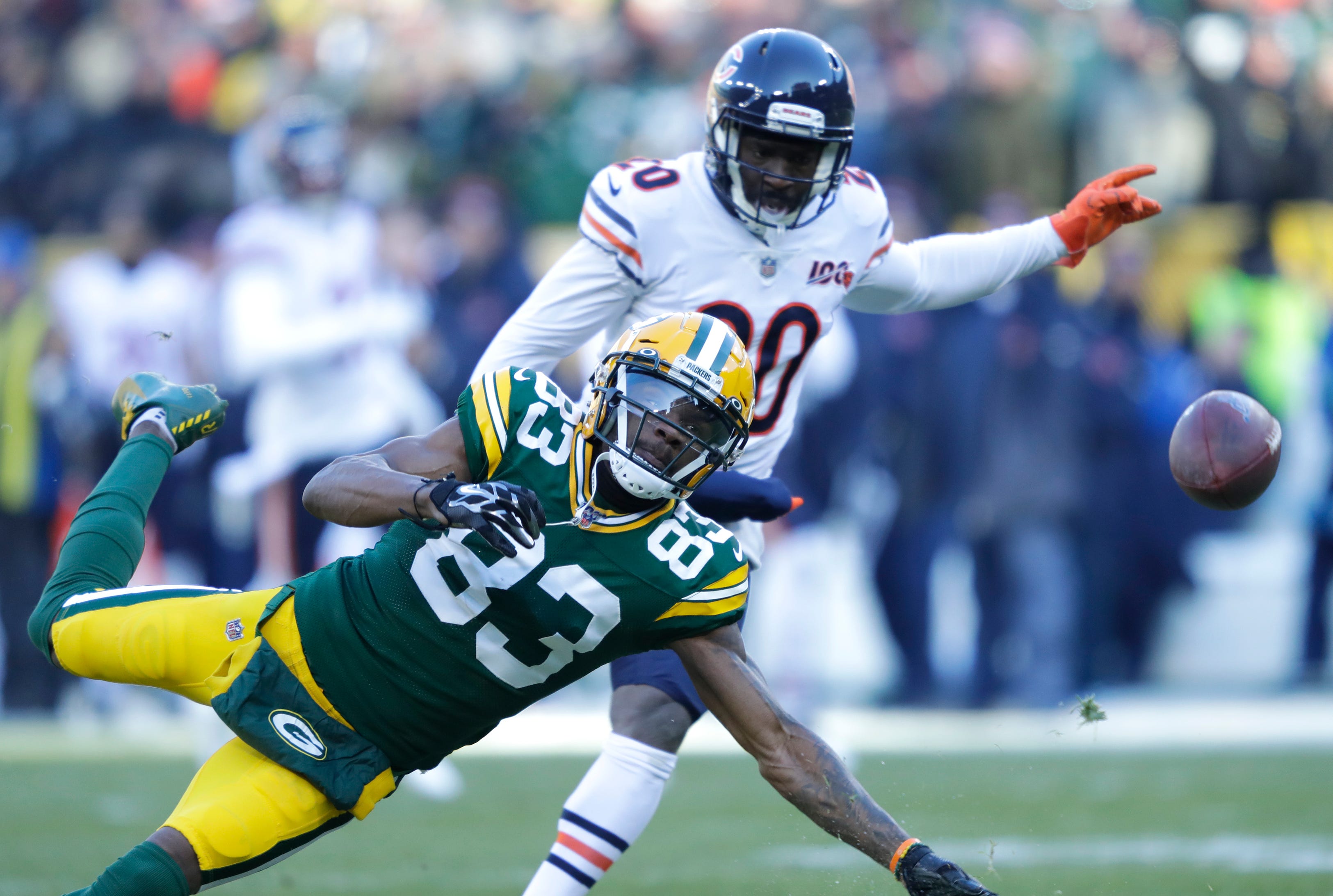 Green Bay Packers wide receiver Marquez Valdes-Scantling (83) drops a pass in the first quarter as he is covered by Chicago Bears cornerback Prince Amukamara (20) Sunday, December 15, 2019, at Lambeau Field in Green Bay, Wis.