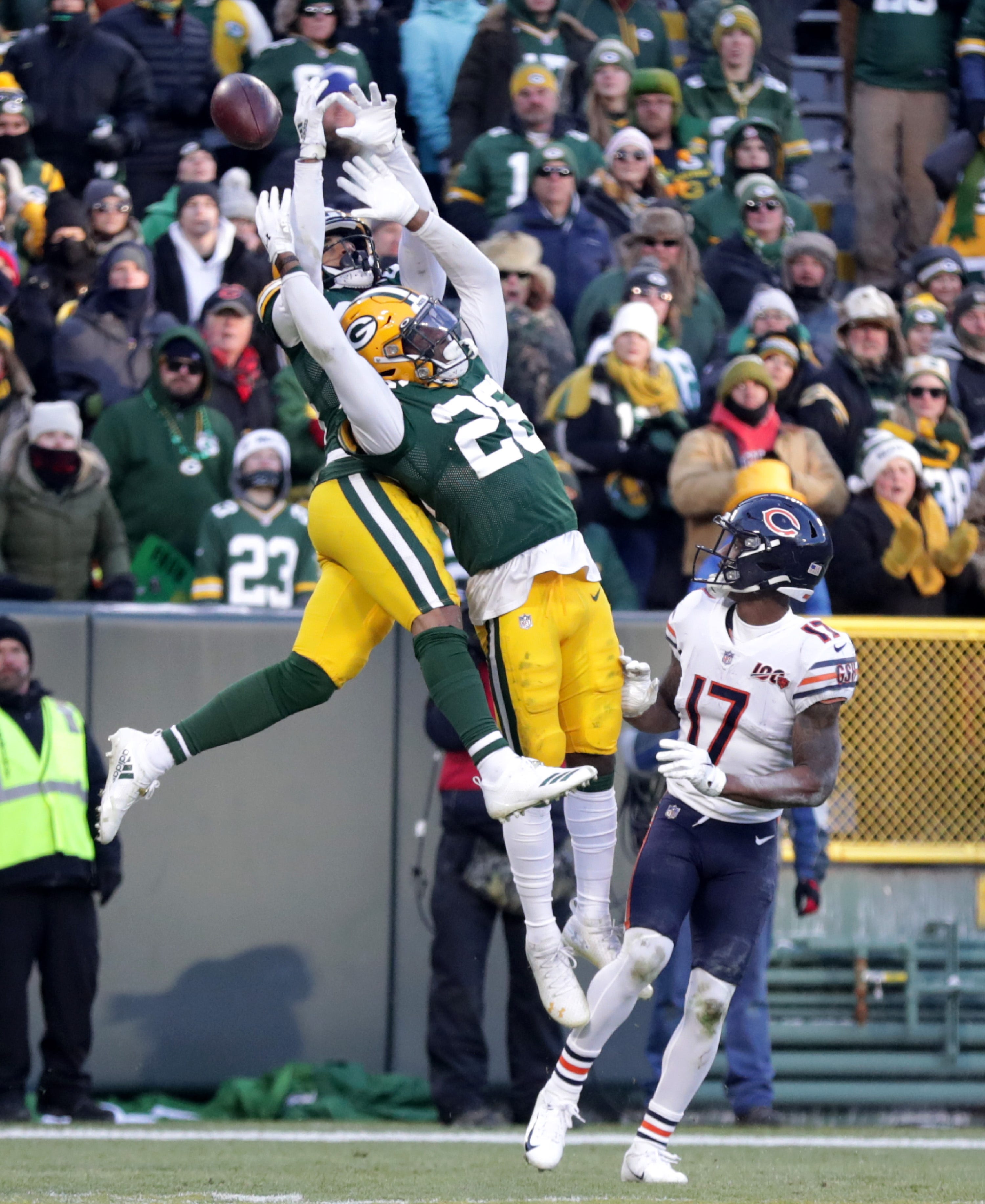 Green Bay Packers cornerback Jaire Alexander (23) and free safety Darnell Savage (26) try to break up a a pass in the end zone intended for Chicago Bears wide receiver Riley Ridley (88) on the final drive during their football game on Sunday, December 15, 2019, at Lambeau Field in Green Bay, Wis.