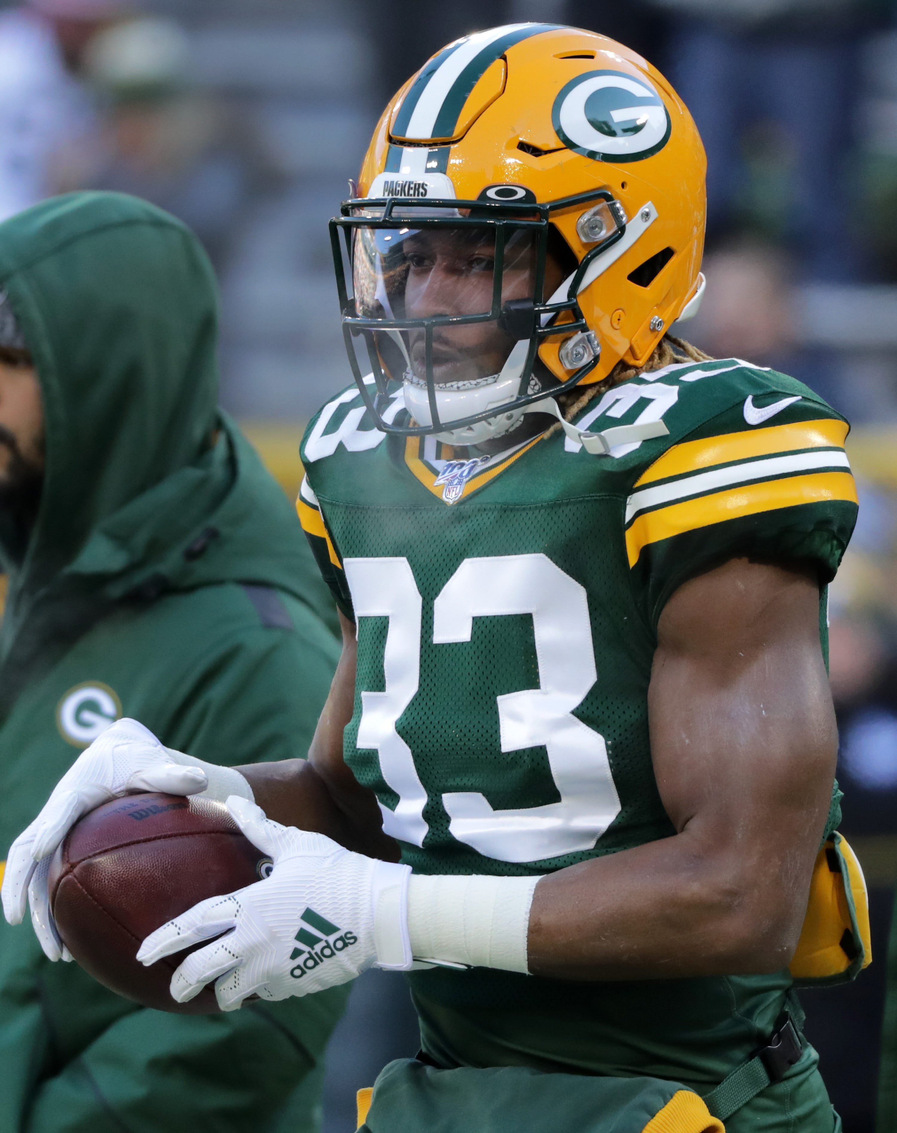 Green Bay Packers running back Aaron Jones (33) warms up before the Packers host the Chicago Bears on Sunday, December 15, 2019, at Lambeau Field in Green Bay, Wis.