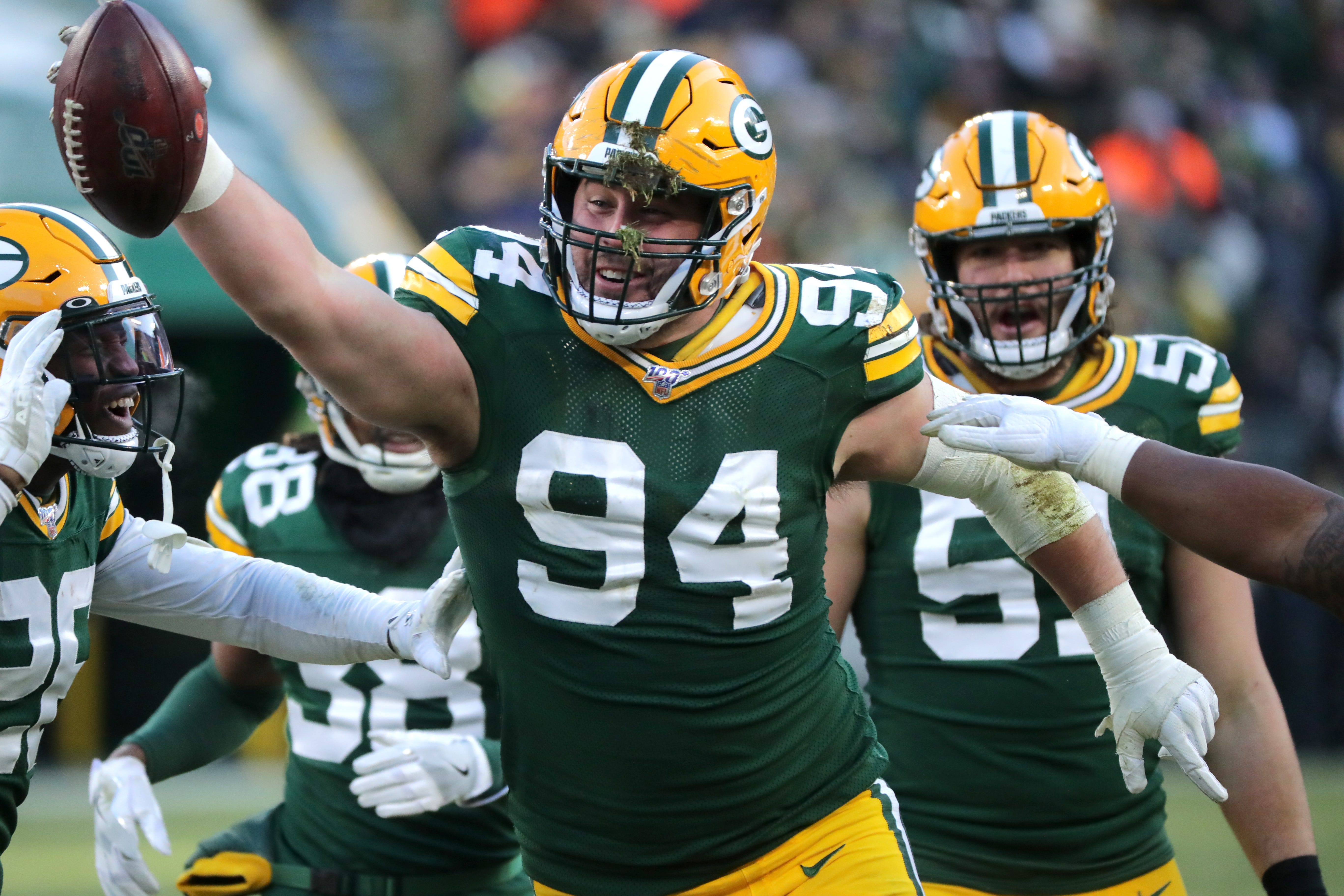 Green Bay Packers defensive end Dean Lowry (94) celebrates his interception during the fourth quarter of their game Sunday, December 15, 2019 at Lambeau Field in Green Bay, Wis. The Green Bay Packers beat the Chicago Bears 21-13.