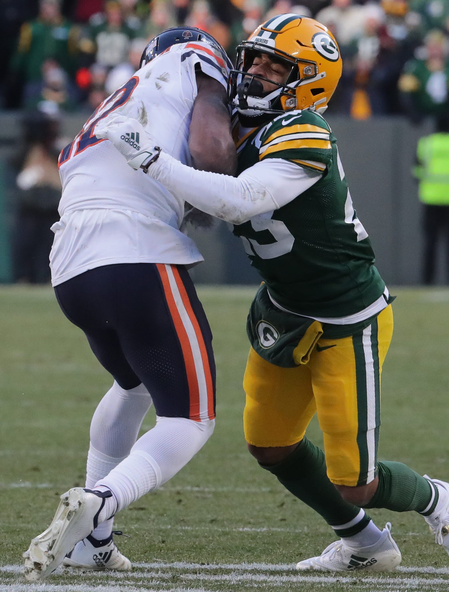 Green Bay Packers cornerback Jaire Alexander (23) stops Chicago Bears wide receiver Allen Robinson (12) in his tracks during the fourth quarter of their game Sunday, December 15, 2019 at Lambeau Field in Green Bay, Wis. The Green Bay Packers beat the Chicago Bears 21-13.