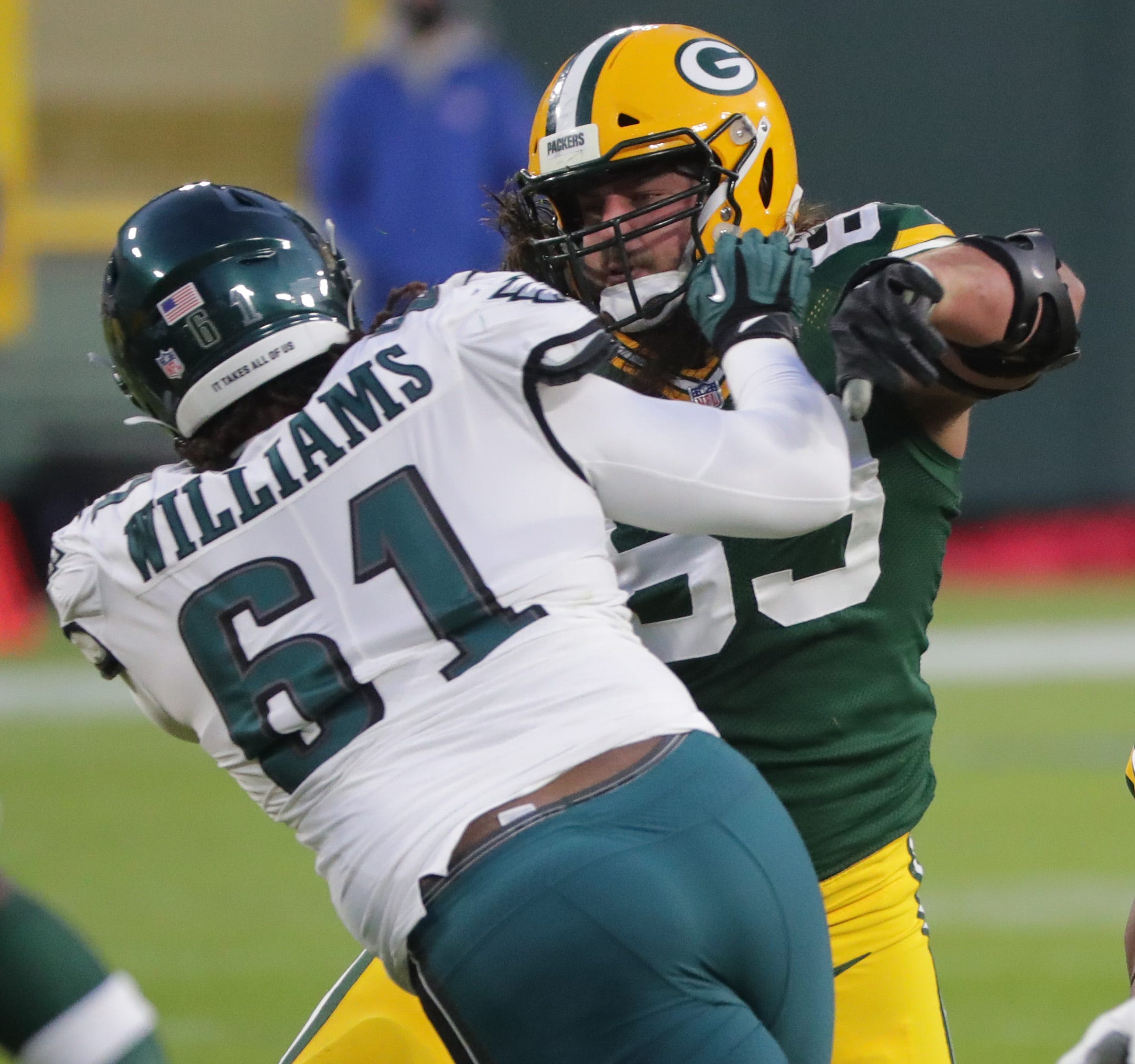 Green Bay Packers offensive tackle David Bakhtiari (69) blocks Philadelphia Eagles defensive tackle Raequan Williams (61) during the second quarter of their game Sunday, December 6, 2020 at Lambeau Field in Green Bay, Wis.