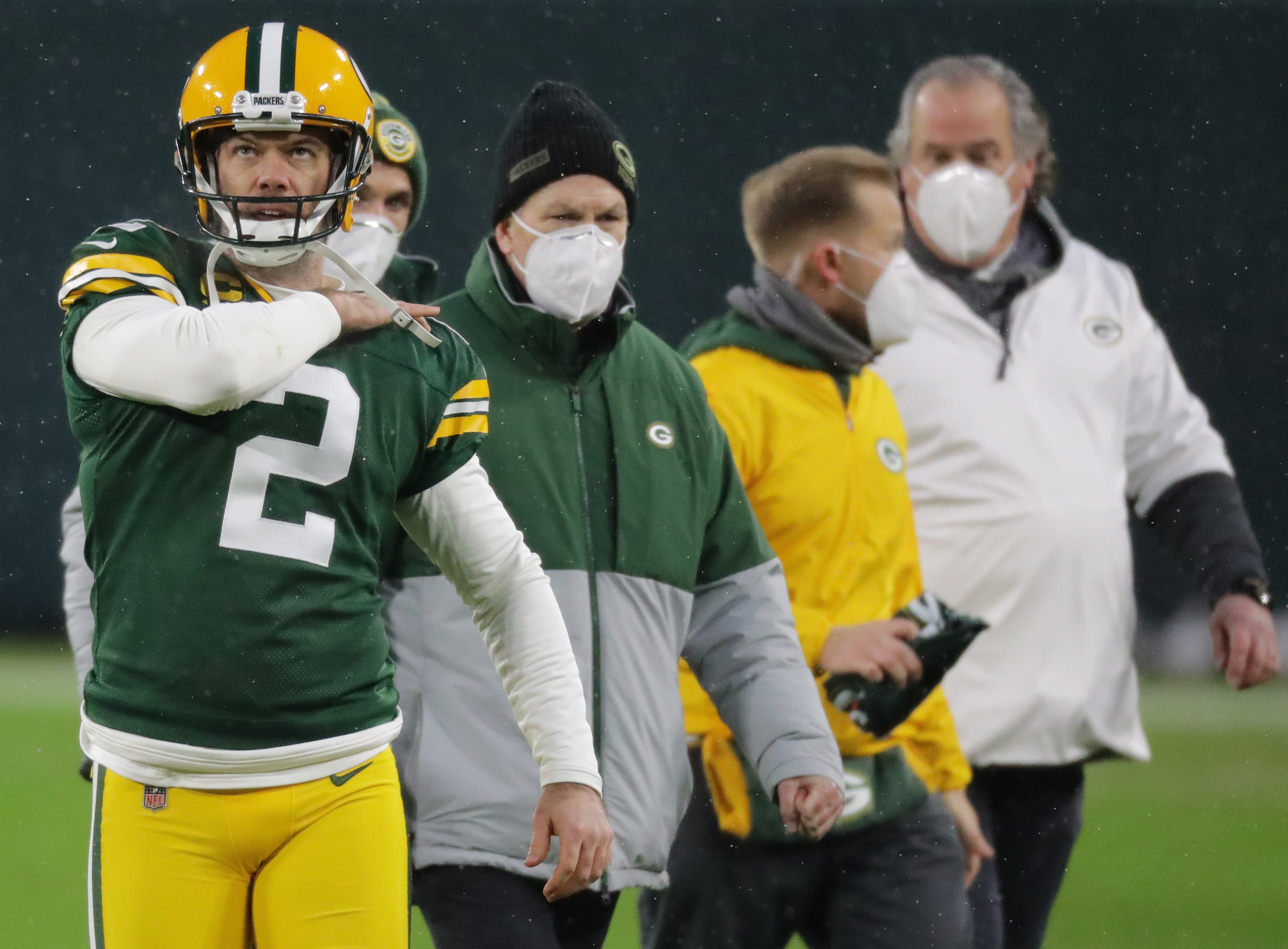 Green Bay Packers placekicker Mason Crosby (2) shakes off an injury during the second quarter of their divisional championship game against the Los Angeles Rams Saturday, January 16, 2021, at Lambeau Field in Green Bay, Wis.