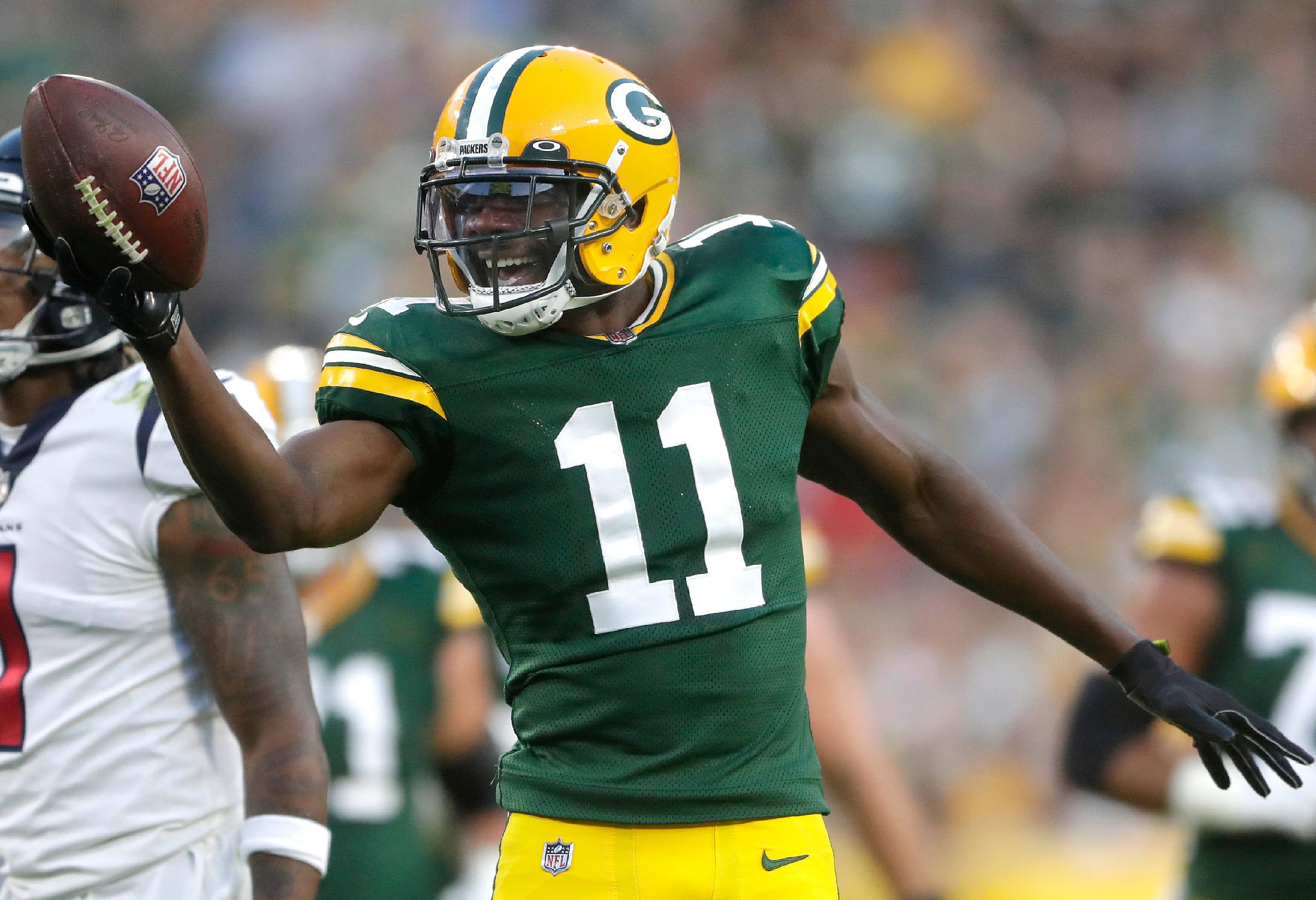 Green Bay Packers wide receiver Devin Funchess celebrates a catch during the preseason game against the Houston Texans on Saturday, Aug. 14, 2021, at Lambeau Field in Green Bay.