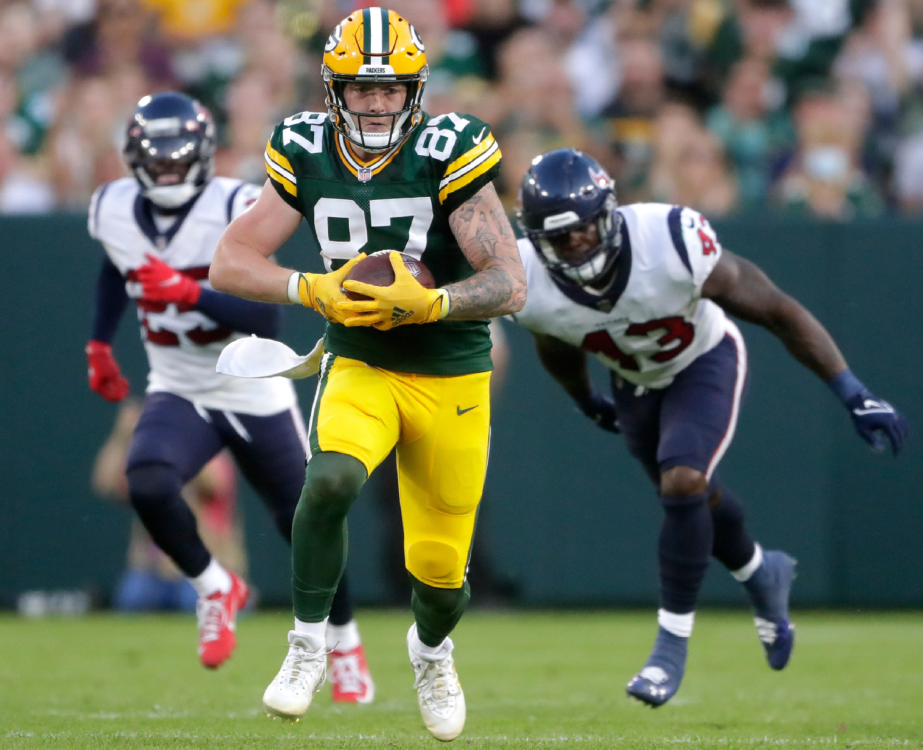 Green Bay Packers tight end Jace Sternberger (87) runs following a catch against the Houston Texans during a preseason game on Saturday, Aug. 14, 2021, at Lambeau Field in Green Bay.