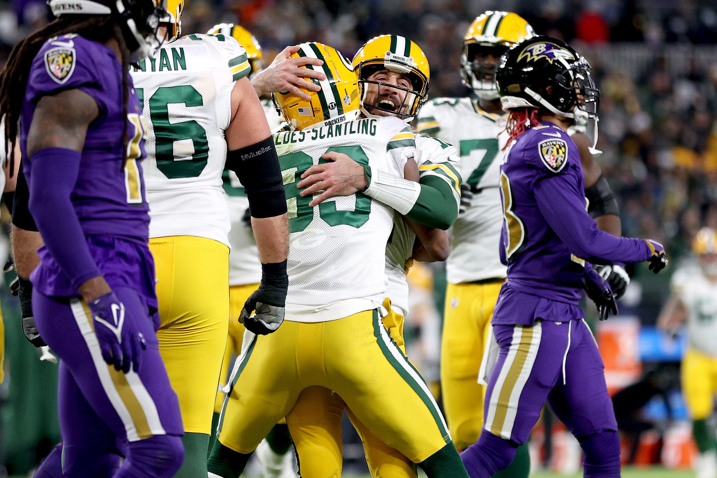 Aaron Rodgers and Marquez Valdes-Scantling celebrate a touchdown against the Baltimore Ravens in the fourth quarter on Sunday, Dec. 19, 2021, at M&T Bank Stadium in Baltimore.