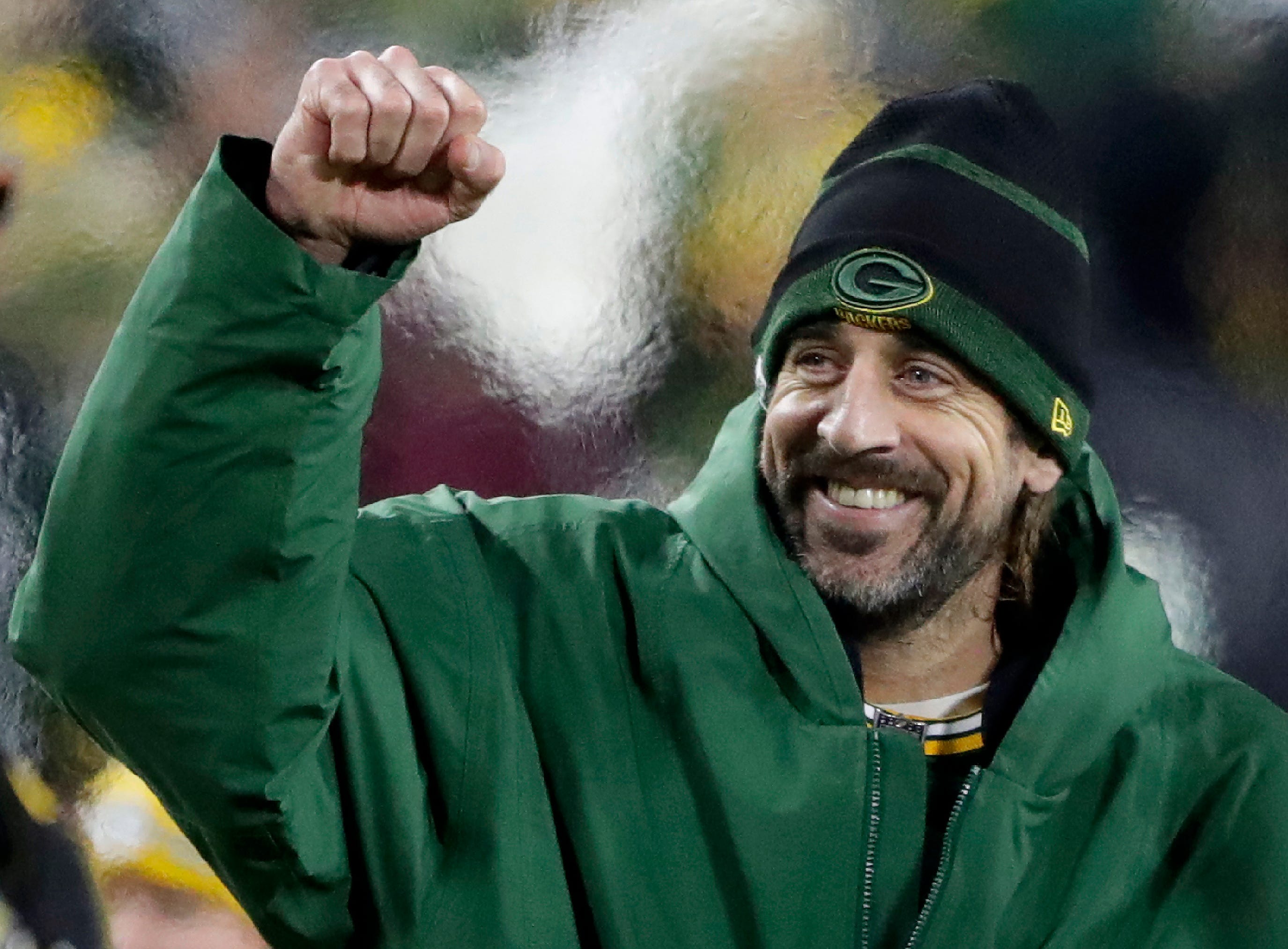 Green Bay Packers quarterback Aaron Rodgers (12) following the Packers' victory over the Chicago Bears during their football game on Sunday, Dec. 12, 2021, at Lambeau Field in Green Bay, Wis.