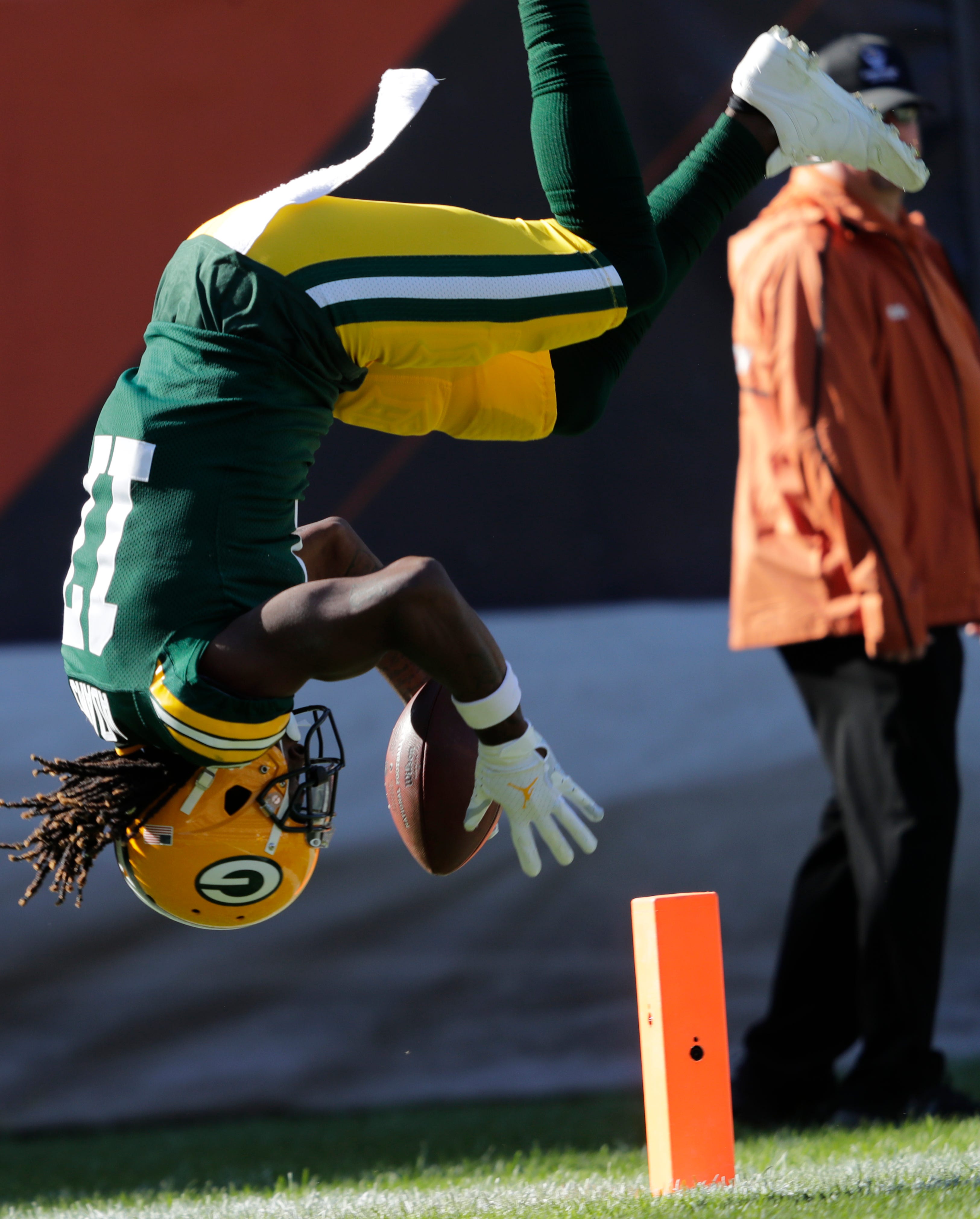 Green Bay Packers wide receiver Davante Adams (17) dives into the end zone after a long first down reception in the fourth quarter against the Chicago Bears during their football game Sunday, Oct. 17, 2021, at Soldier Field in Chicago, Ill. Adams stepped out of bounds before reaching the end zone. Green Bay won 24-14.