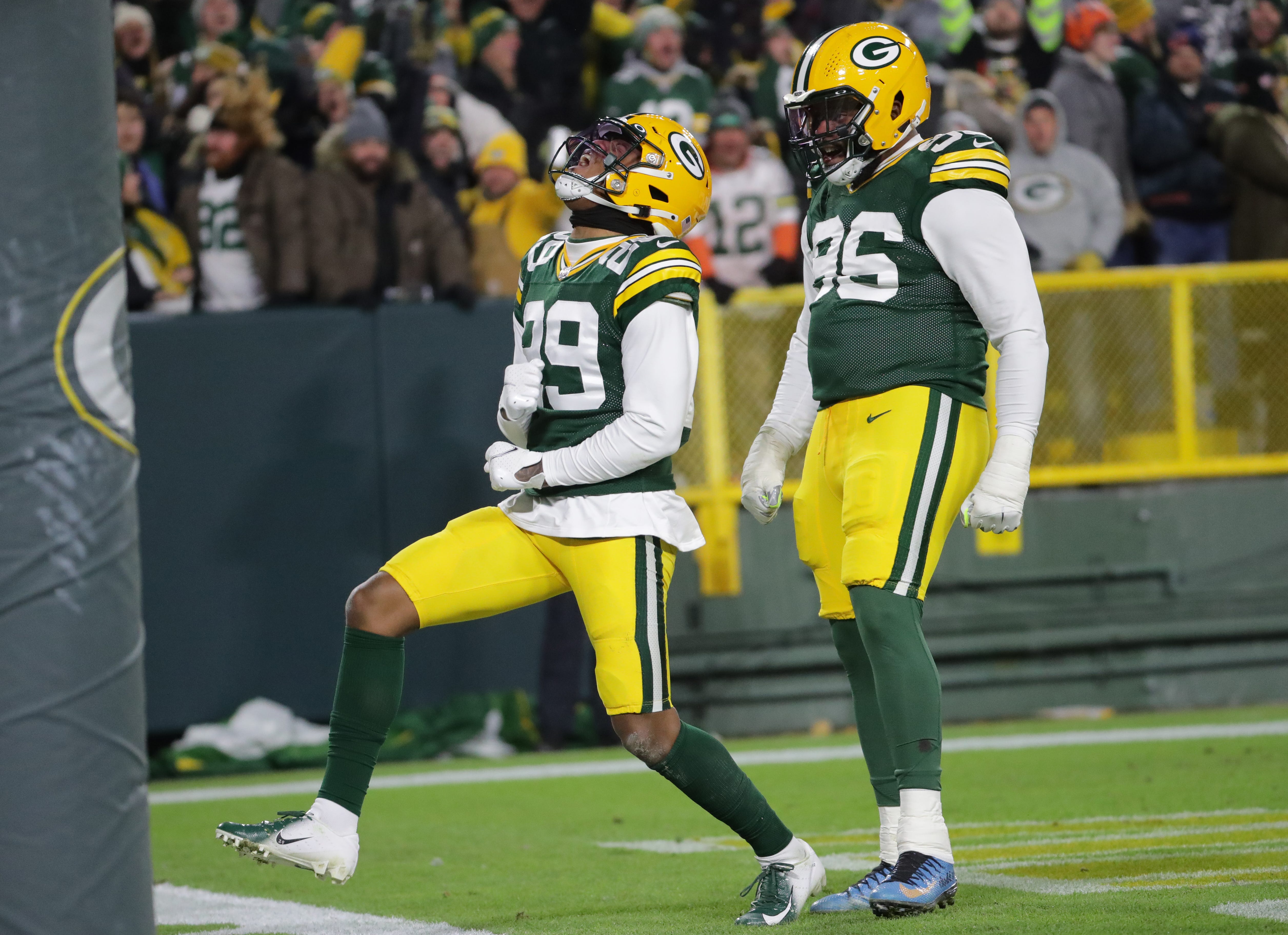 Green Bay Packers cornerback Rasul Douglas (29) exults after returning an interception 55 yard for a touchdown during the second quarter of their game Sunday, December 12, 2021 at Lambeau Field in Green Bay, Wis. The Green Bay Packers beat the Chicago Bears 45-30.