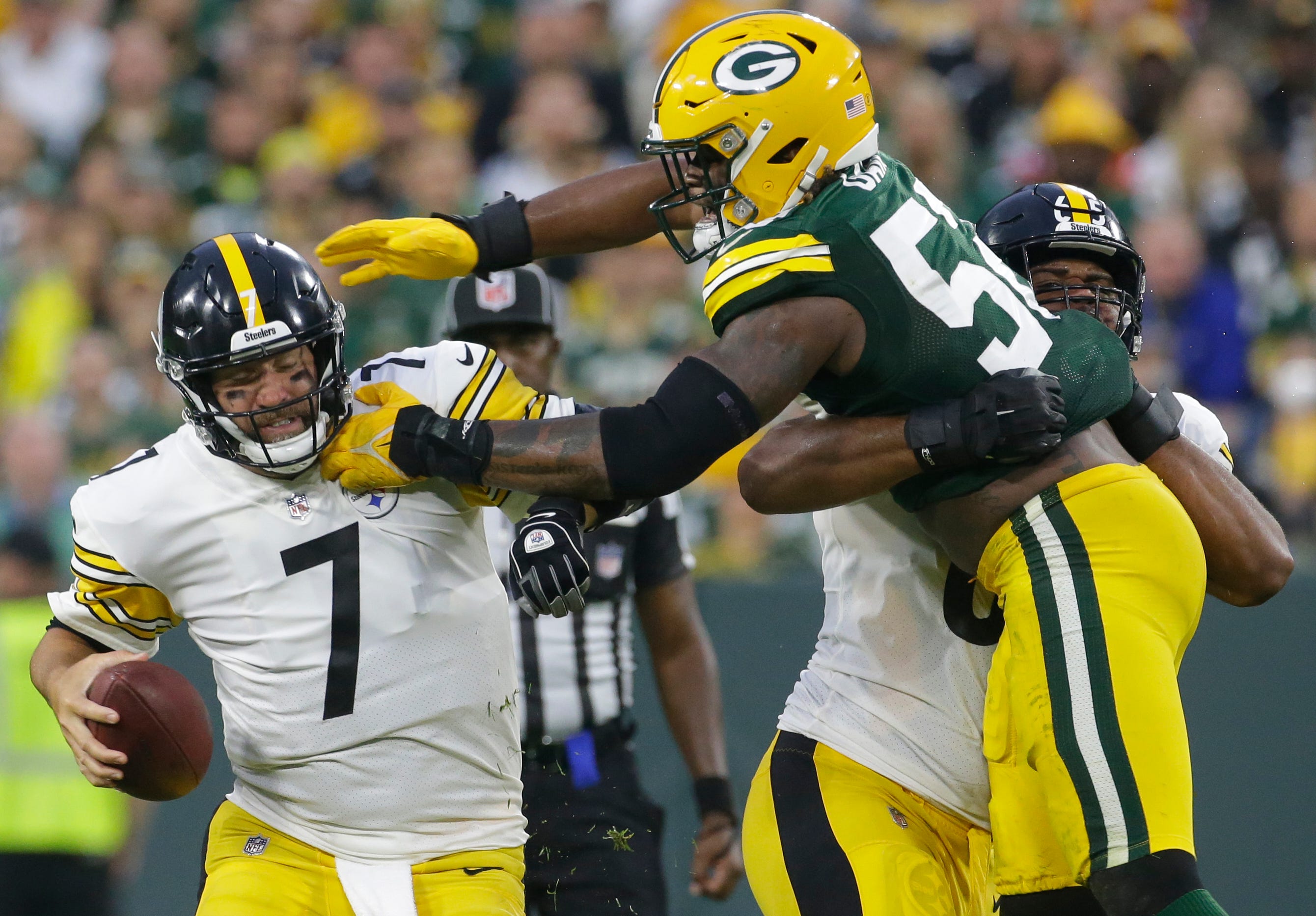 Green Bay Packers linebacker Rashan Gary (52) sacks Pittsburgh Steelers quarterback Ben Roethlisberger (7) during the fourth quarter of their game Sunday, October 3, 2021 at Lambeau Field in Green Bay, Wis. Green Bay Packers beat the Pittsburgh Steelers 27-17.