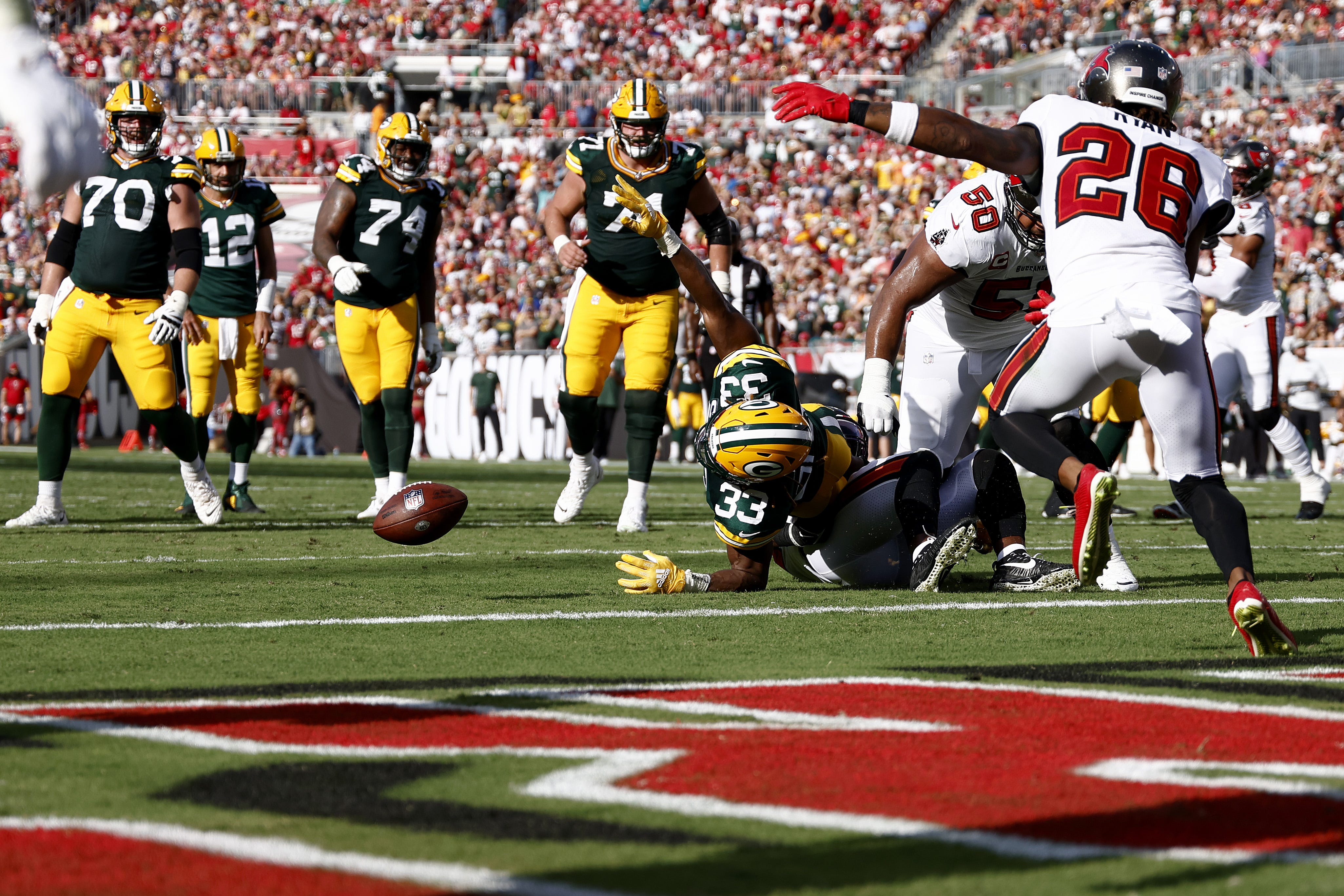 Packers running back Aaron Jones fumbles the ball on the goal line during the second quarter against the Buccaneers on Sept. 25, 2022, at Raymond James Stadium in Tampa, Florida.
