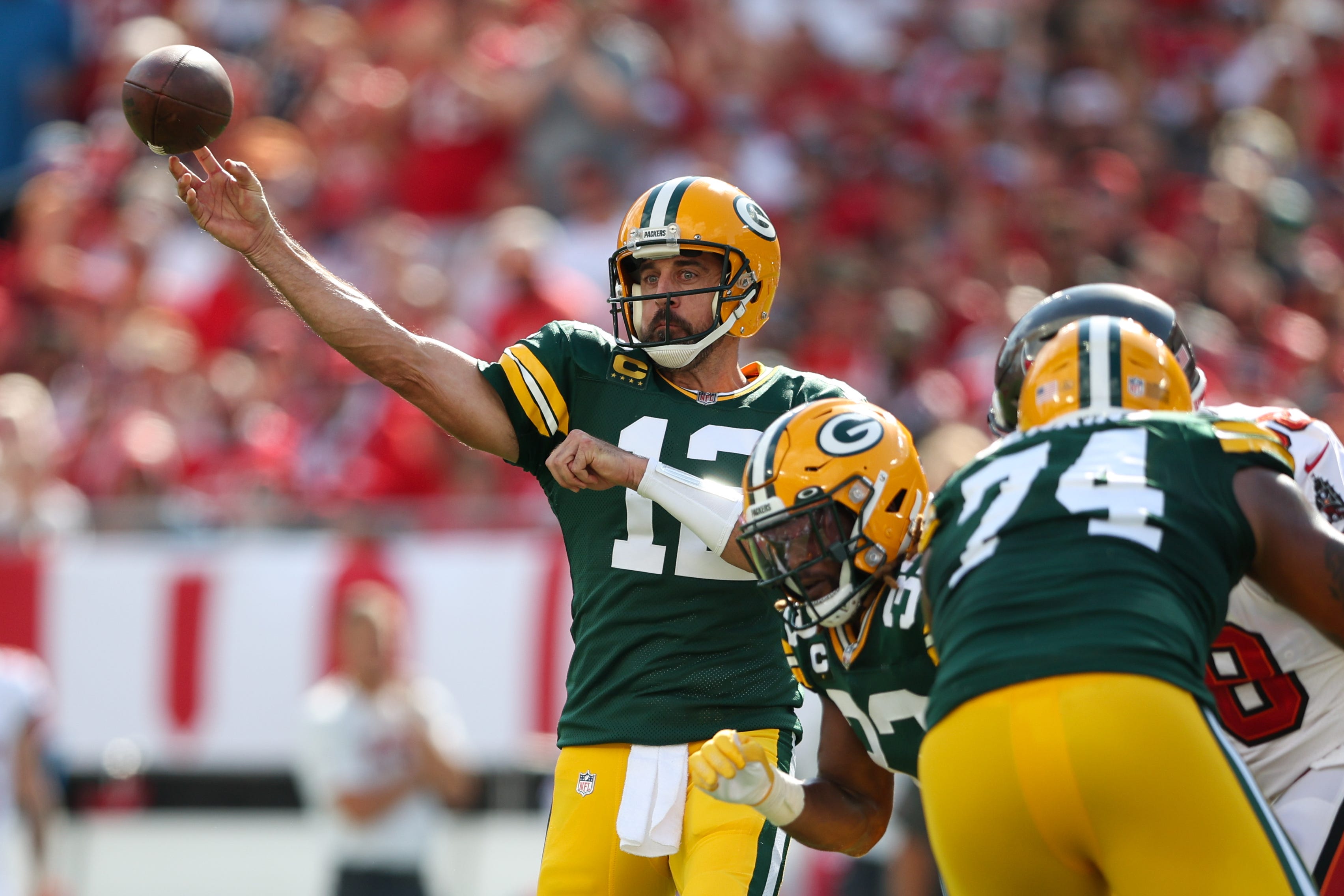 Green Bay Packers quarterback Aaron Rodgers drops back to pass against the Tampa Bay Buccaneers in the first quarter on Sept, 25, 2022, at Raymond James Stadium in Tampa, Florida.