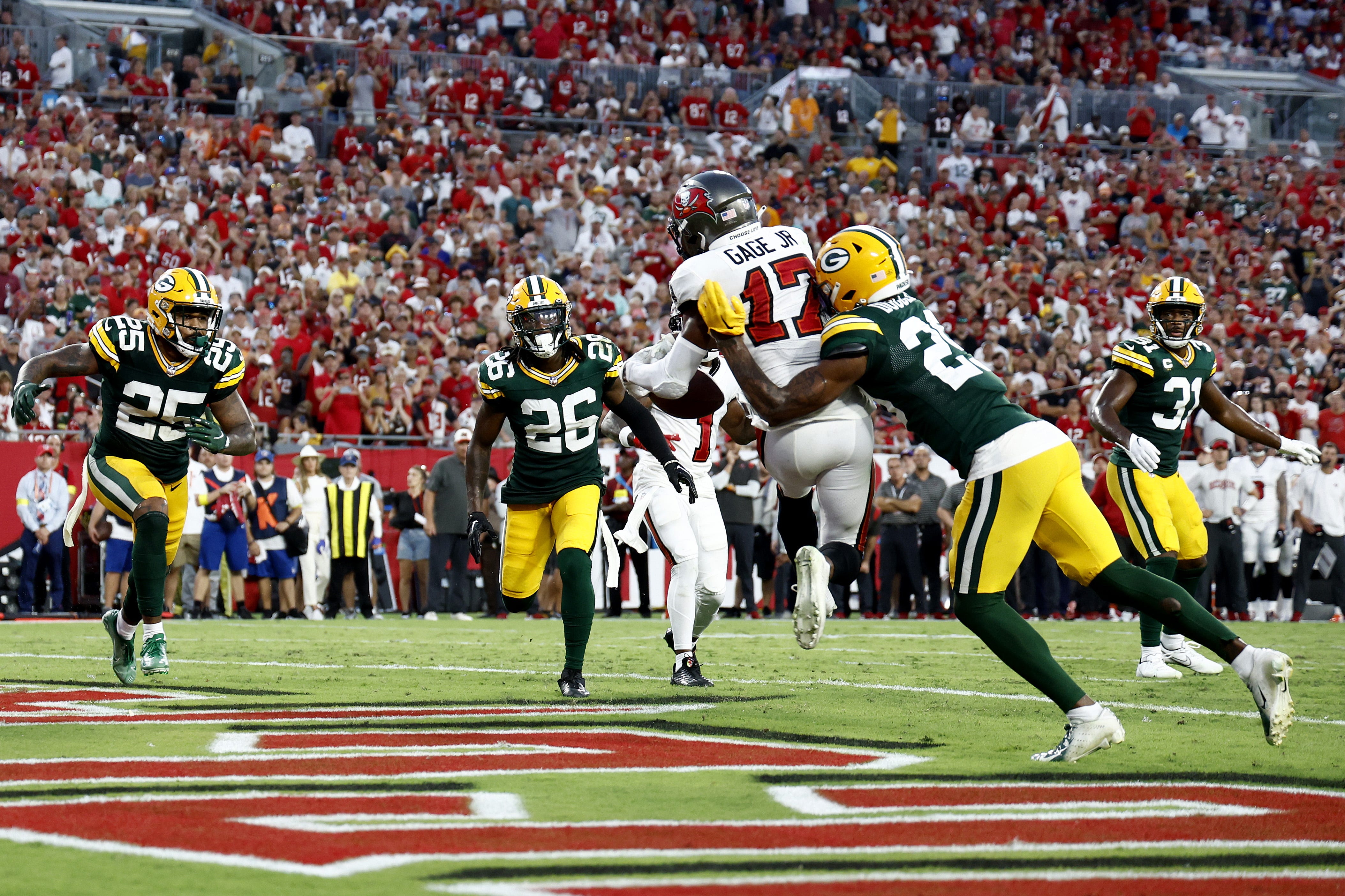 Russell Gage of the Tampa Bay Buccaneers scores a touchdown late in the fourth quarter against the Green Bay Packers on Sept. 25, 2022, at Raymond James Stadium in Tampa, Florida.